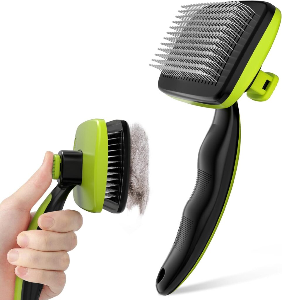 A hand presses a button on a green and black pet grooming brush, releasing collected fur from the bristles. Another view highlights the metal bristles and ergonomic handle, making this brush a thoughtful gift idea for pet owners. alwaysagift.co.uk