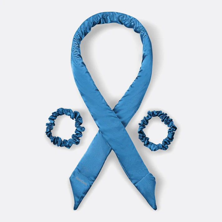 A blue satin heatless curling headband is arranged in a loop with two matching blue satin scrunchies placed on either side against a light gray background, making it a perfect gift idea for effortless styling. alwaysagift.co.uk