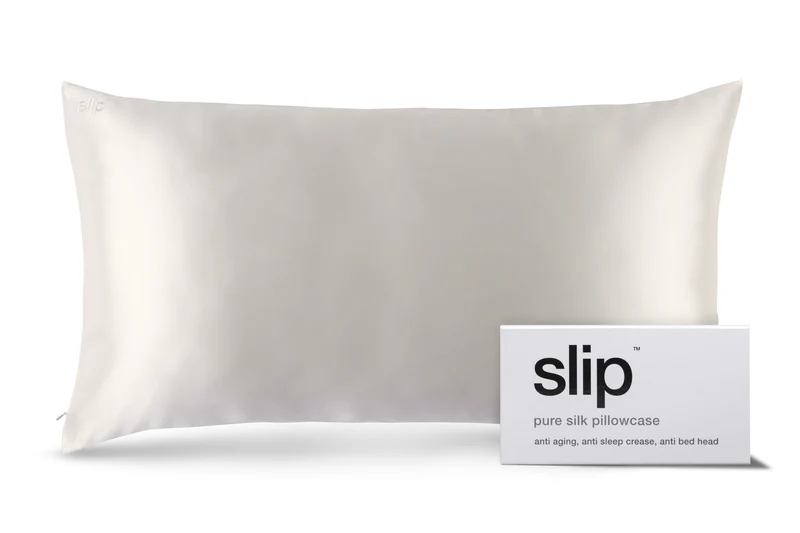 A white silk pillowcase with a small box in front labeled slip pure silk pillowcase, anti aging, anti sleep crease, and bed head on a plain white background—an elegant gift idea for any occasion. alwaysagift.co.uk