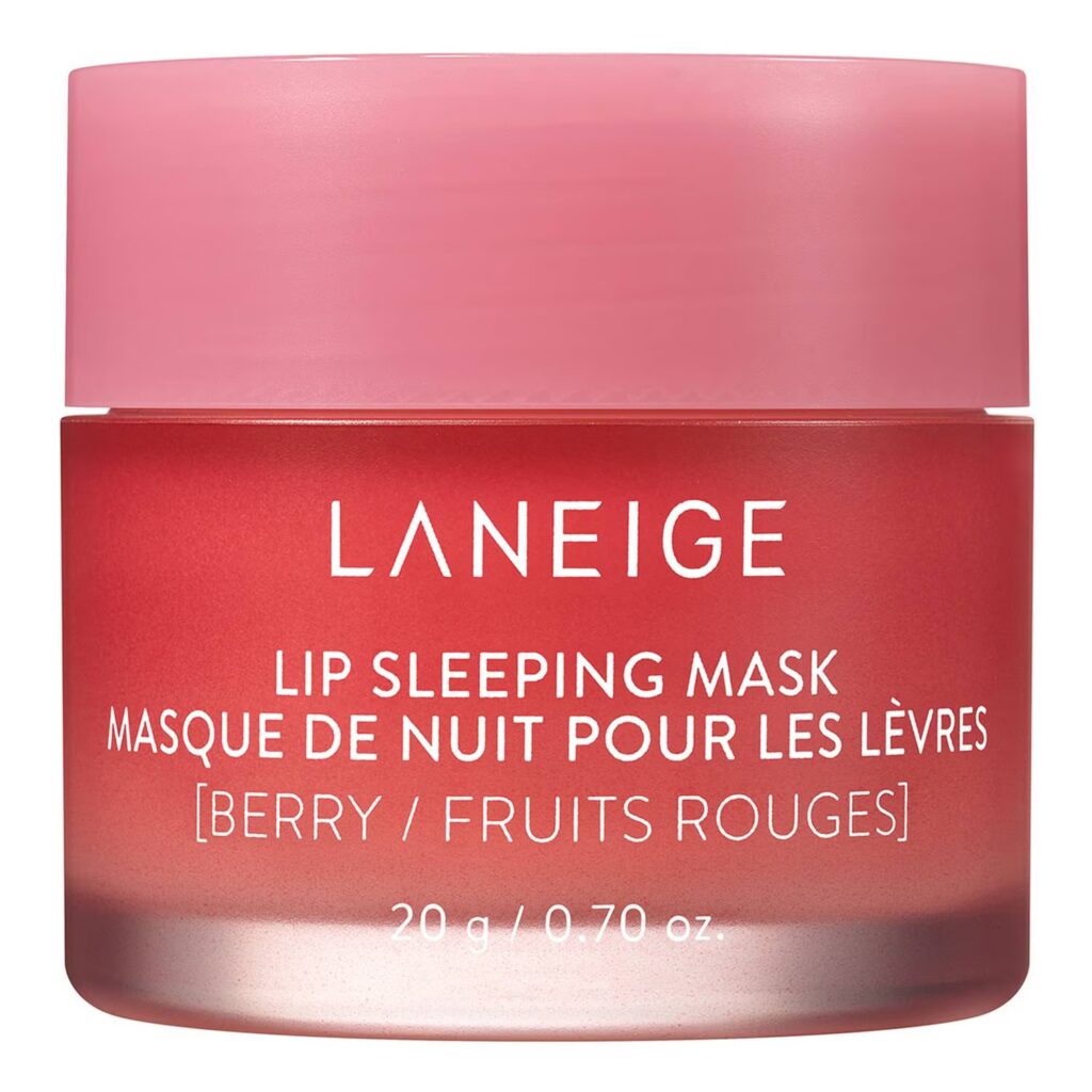 A pink jar of Laneige Lip Sleeping Mask in berry flavor, labeled in English and French, with a net weight of 20 grams (0.70 oz)—a perfect gift idea for soft, hydrated lips. alwaysagift.co.uk