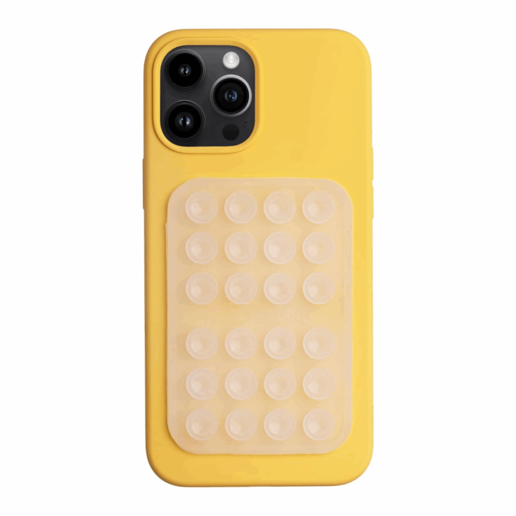 A yellow smartphone with a matching yellow case featuring a rectangular silicone pad with multiple suction cups on the back—a fun and practical gift idea. alwaysagift.co.uk