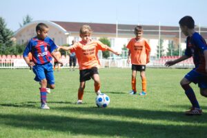group of boys playing football