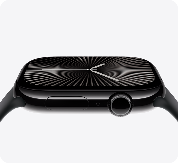 A close-up side view of a black smartwatch with a sleek, curved display showing a minimalist watch face with radiating lines and two thin watch hands—a perfect gift idea. The crown and side button are visible on the right. alwaysagift.co.uk