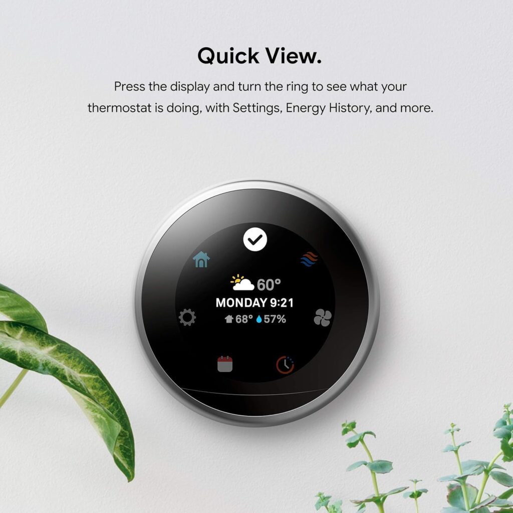 A smart thermostat is mounted on a white wall displaying temperature, day, time, and settings. Text above explains how to check settings, energy history, and more using Elementor. Green plant leaves appear on the left side of the image. alwaysagift.co.uk