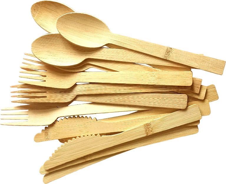 A pile of bamboo utensils, including forks, spoons, and serrated knives, arranged in a scattered stack on a white Elementor-themed background. alwaysagift.co.uk