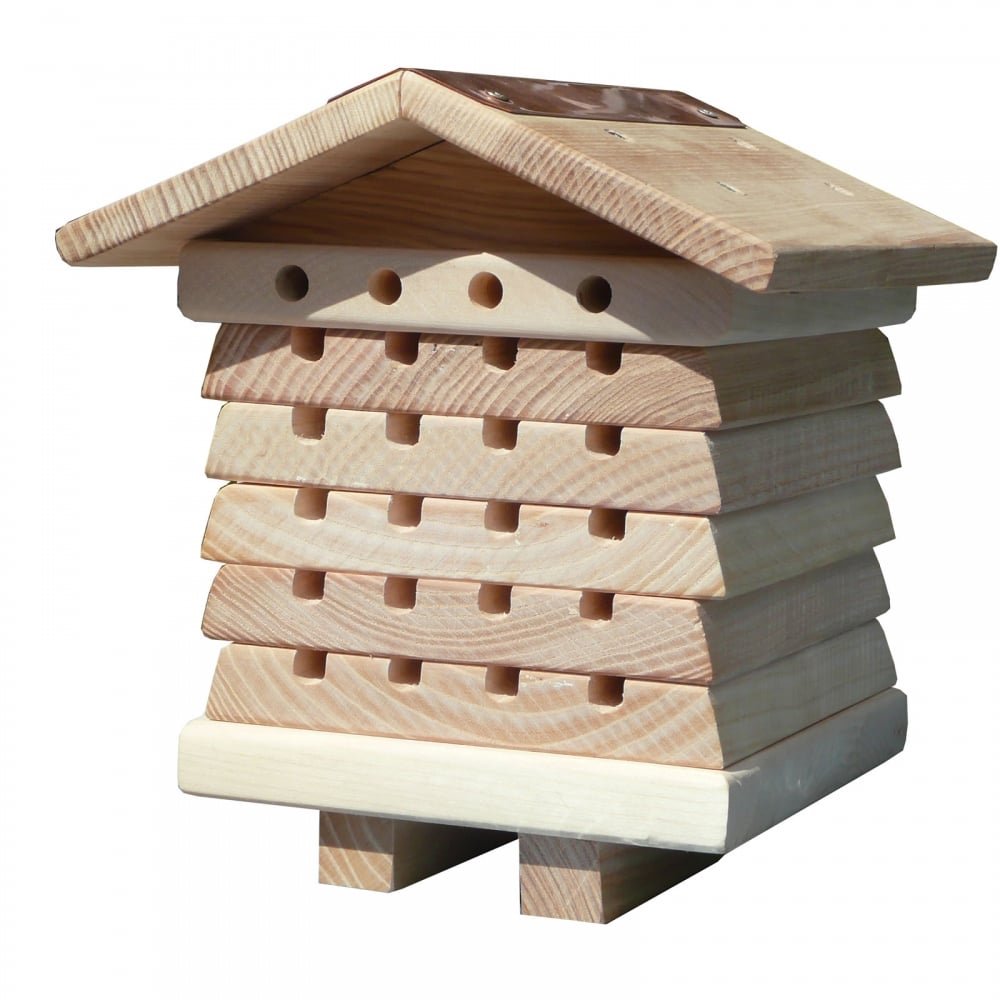 A wooden insect hotel with a slanted roof and multiple stacked layers, designed using Elementor, featuring rows of circular and rectangular holes to provide shelter for pollinators and beneficial insects. alwaysagift.co.uk
